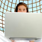 woman behind laptop