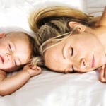 mom and baby sleeping - baby lag