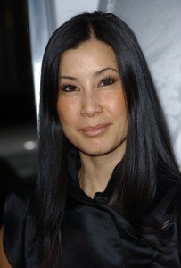 TV journalist Lisa Ling compares her bump to a beer belly